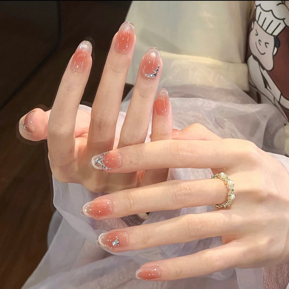 0.7 inch oval nude gradient glitter and diamond wearing nail art
