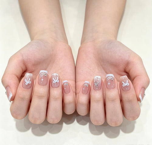 0.62 inch square pink cat eye glitter bow wearing nail art