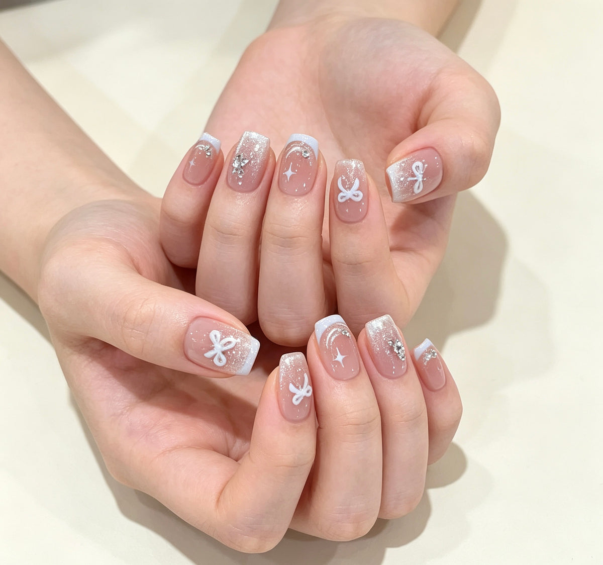 0.62 inch square pink cat eye glitter bow wearing nail art