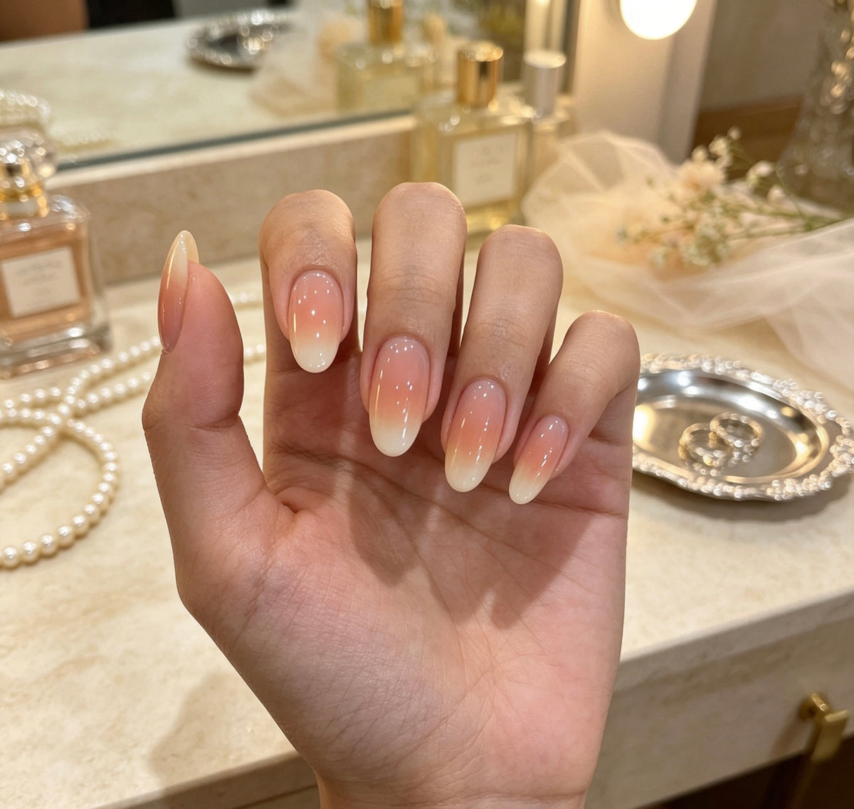 0.7-inch oval nude pink gradient French mango tip press nail art