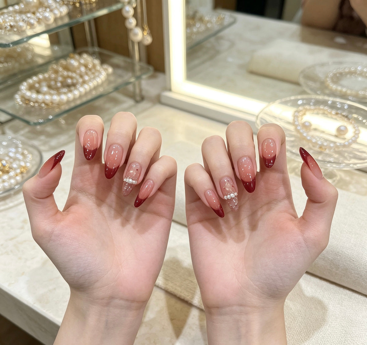 0.94-inch oval nude French polka dot red tip wearing nail art