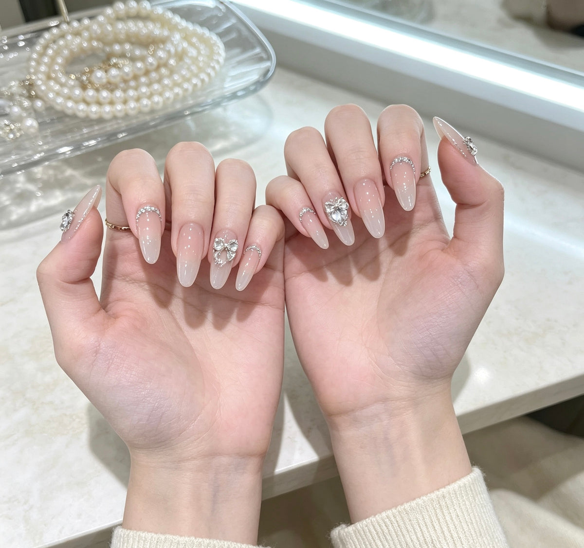 0.94-inch oval nude color rhinestone wearing nail art