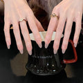 0.94-inch oval nude glitter wearing nail art